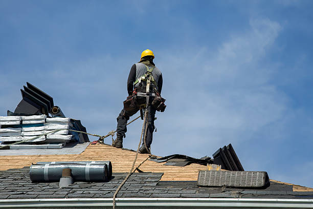 Professional Storm Damage Roof Repair technician working in Port Reading, NJ